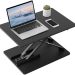 Standing desk converter with laptop and smartphone on black adjustable riser